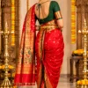Festive Red Saree in a Temple Setting